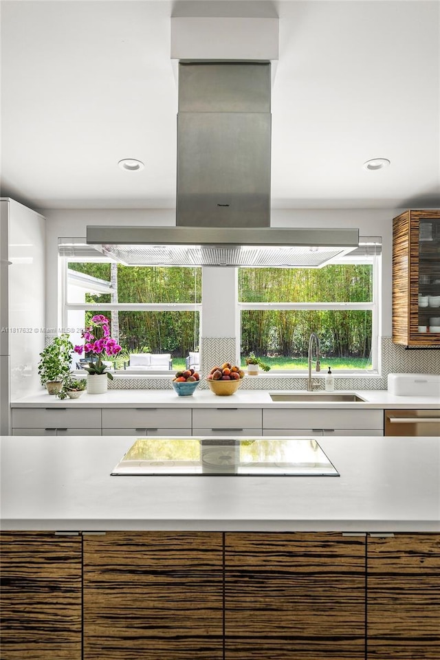 11001 SW 64th Ave, Pinecrest, FL 33156 - kitchen featuring light countertops, island exhaust hood, modern cabinets, plenty of natural light, and recessed lighting