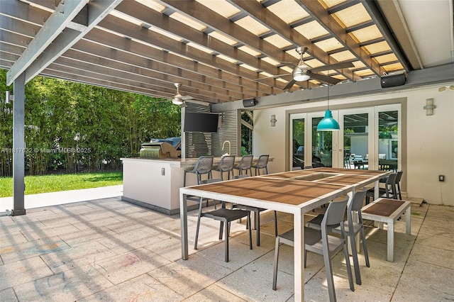 11001 SW 64th Ave, Pinecrest, FL 33156 - view of patio / terrace with a ceiling fan, a pergola, outdoor dining area, and area for grilling