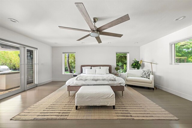 11001 SW 64th Ave, Pinecrest, FL 33156 - bedroom featuring multiple windows, access to exterior, wood finished floors, and recessed lighting