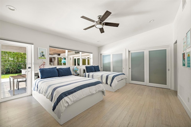 11001 SW 64th Ave, Pinecrest, FL 33156 - bedroom with access to exterior, light wood-style floors, french doors, a ceiling fan, and recessed lighting