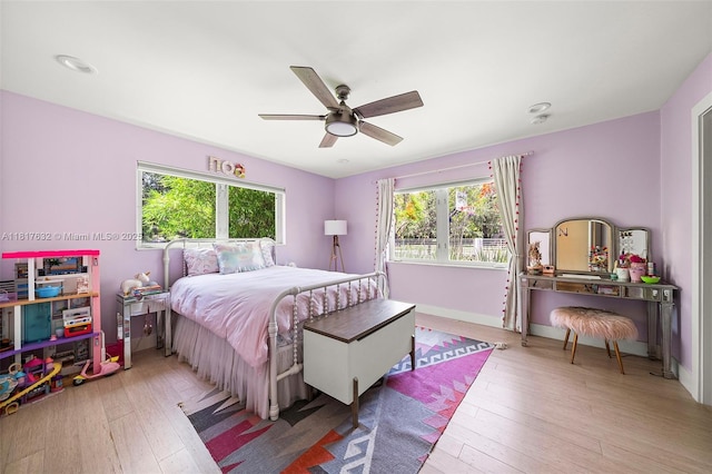 11001 SW 64th Ave, Pinecrest, FL 33156 - bedroom featuring multiple windows, hardwood / wood-style floors, ceiling fan, and recessed lighting