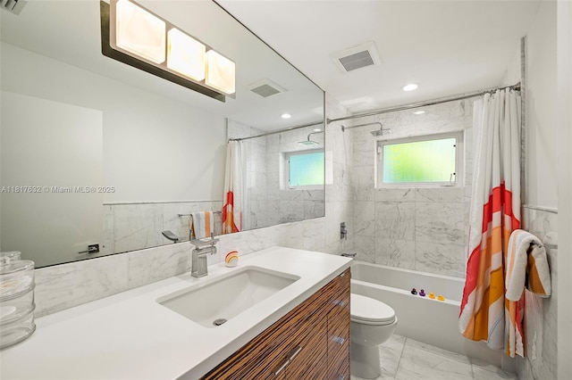 11001 SW 64th Ave, Pinecrest, FL 33156 - bathroom with marble look tiles, vanity, shower / bath combination with curtain, and tile walls