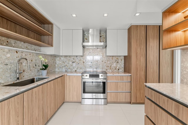 900 Bay Dr Unit 904, Miami Beach, FL 33141 - kitchen featuring open shelves, stainless steel electric stove, wall chimney range hood, a sink, and light stone countertops