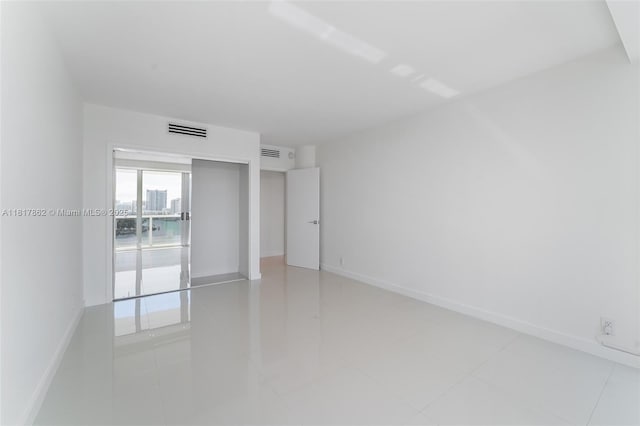 900 Bay Dr Unit 904, Miami Beach, FL 33141 - spare room with baseboards