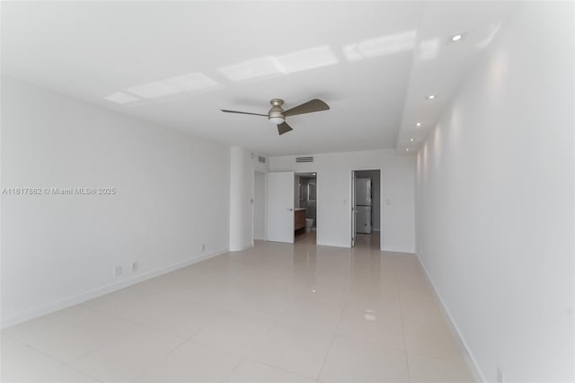900 Bay Dr Unit 904, Miami Beach, FL 33141 - empty room with ceiling fan, light tile patterned flooring, baseboards, and recessed lighting