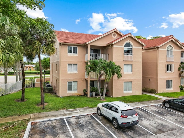 10421 SW 157th Pl Unit 301, Miami, FL 33196 - view of property featuring uncovered parking