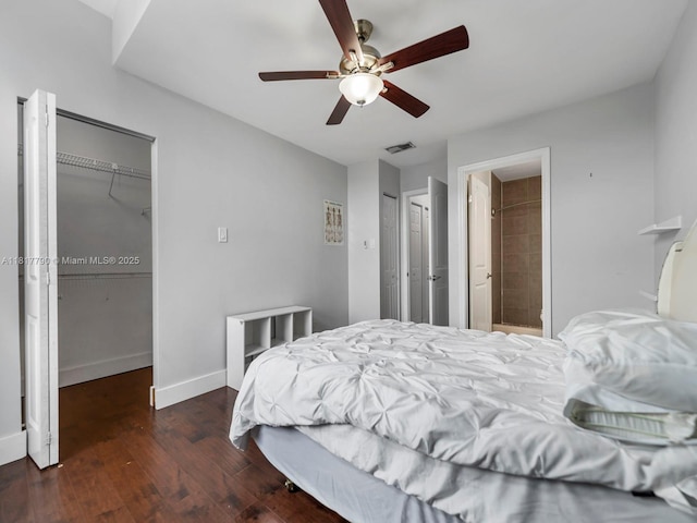 10421 SW 157th Pl Unit 301, Miami, FL 33196 - bedroom with wood finished floors, baseboards, ceiling fan, multiple closets, and connected bathroom