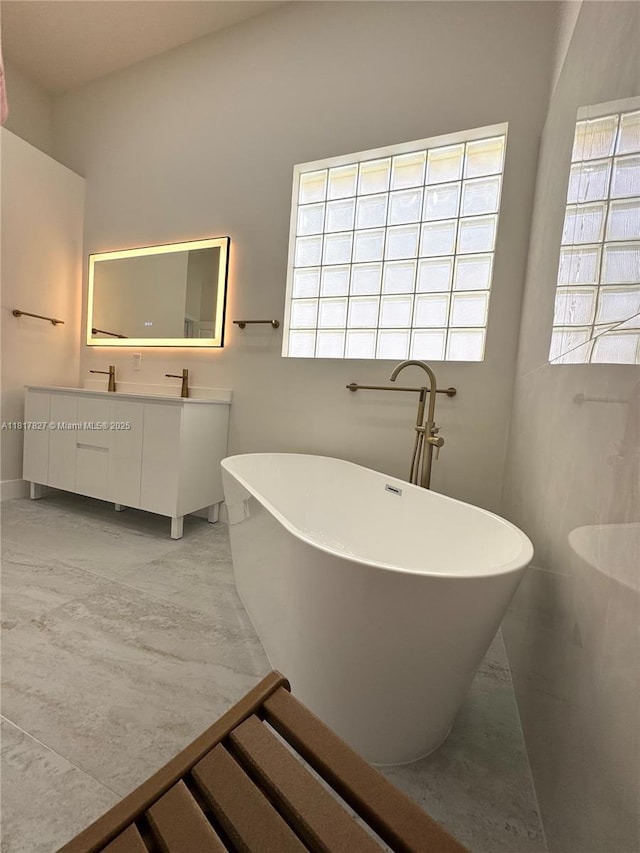 7020 Demedici Cir, Delray Beach, FL 33446 - bathroom featuring vanity and a soaking tub