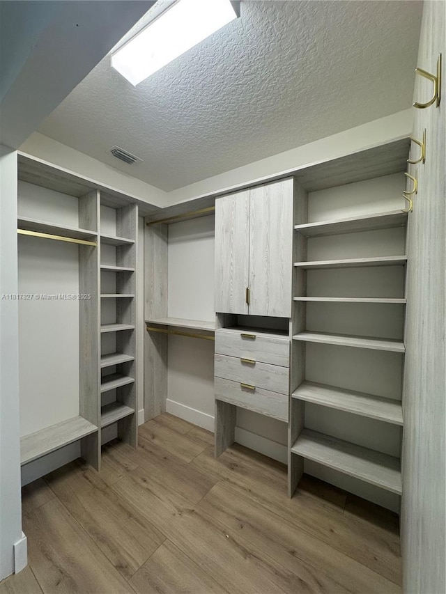 7020 Demedici Cir, Delray Beach, FL 33446 - spacious closet with wood finished floors