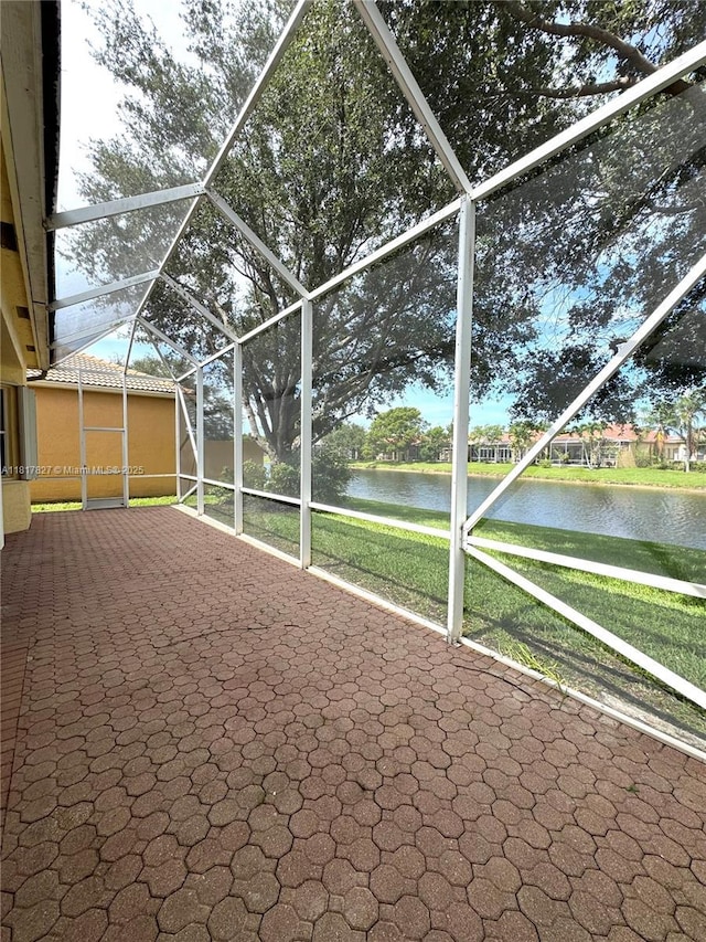 7020 Demedici Cir, Delray Beach, FL 33446 - unfurnished sunroom with a water view