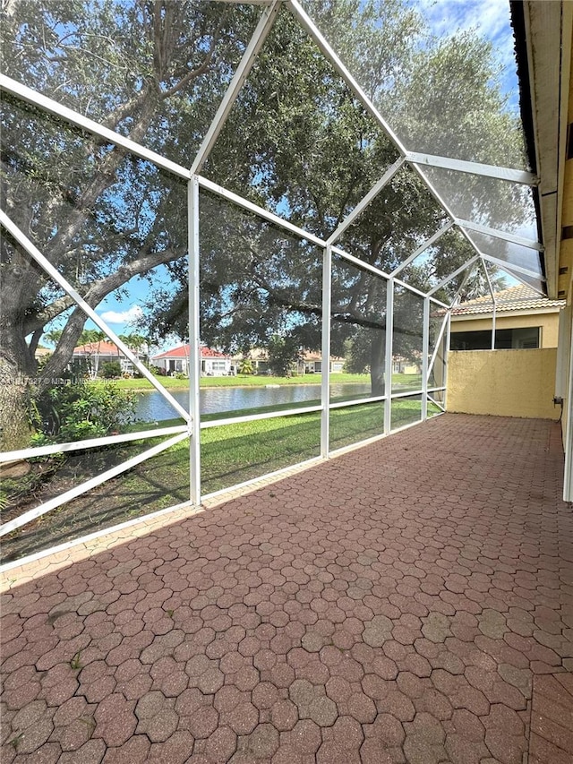 7020 Demedici Cir, Delray Beach, FL 33446 - unfurnished sunroom featuring a water view