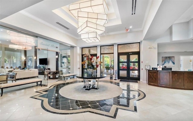 7020 Demedici Cir, Delray Beach, FL 33446 - building lobby with ornamental molding, a high ceiling, and recessed lighting