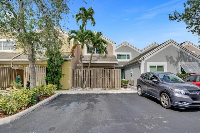 1449 NW 122nd Ter, Pembroke Pines, FL 33026 - townhome / multi-family property featuring stucco siding