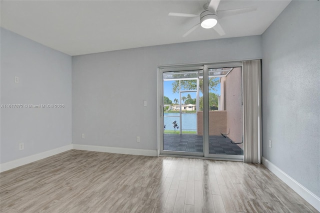1449 NW 122nd Ter, Pembroke Pines, FL 33026 - unfurnished room with wood finished floors and a ceiling fan