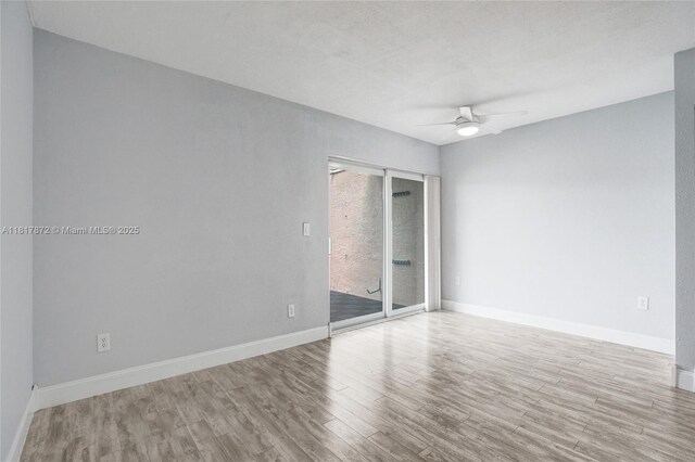 1449 NW 122nd Ter, Pembroke Pines, FL 33026 - spare room with wood finished floors and ceiling fan