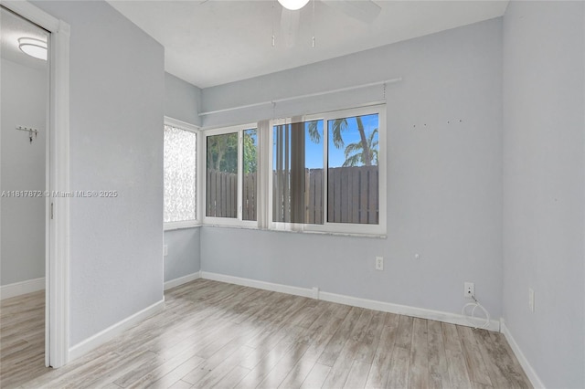 1449 NW 122nd Ter, Pembroke Pines, FL 33026 - empty room with wood finished floors and a ceiling fan