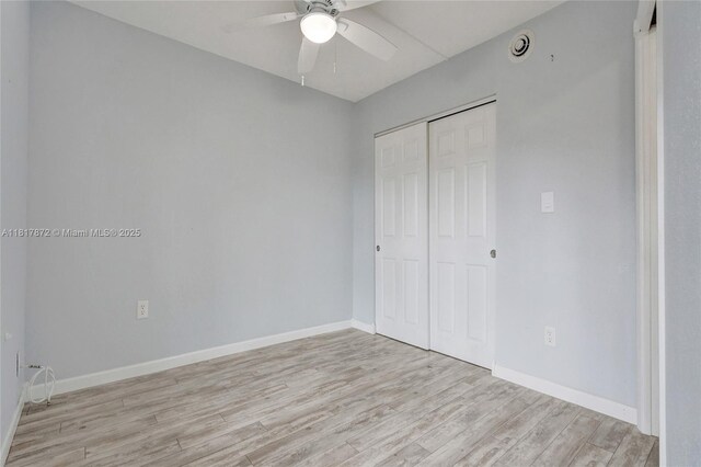 1449 NW 122nd Ter, Pembroke Pines, FL 33026 - unfurnished bedroom featuring light wood-style flooring, a closet, and a ceiling fan