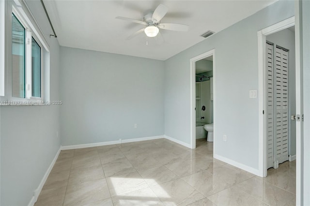 1449 NW 122nd Ter, Pembroke Pines, FL 33026 - spare room featuring a ceiling fan and baseboards