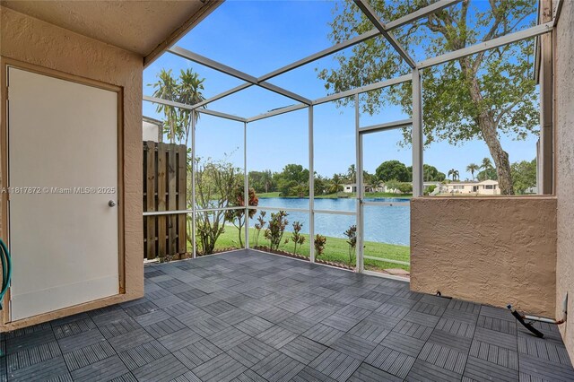 1449 NW 122nd Ter, Pembroke Pines, FL 33026 - unfurnished sunroom featuring a water view