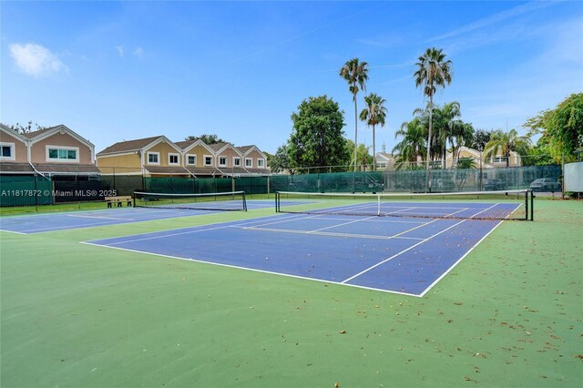 1449 NW 122nd Ter, Pembroke Pines, FL 33026 - view of tennis court with community basketball court
