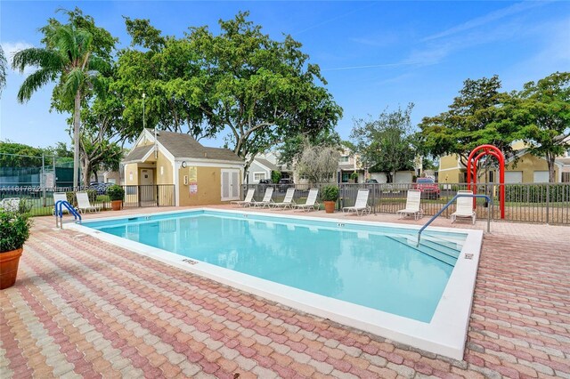 1449 NW 122nd Ter, Pembroke Pines, FL 33026 - view of community pool