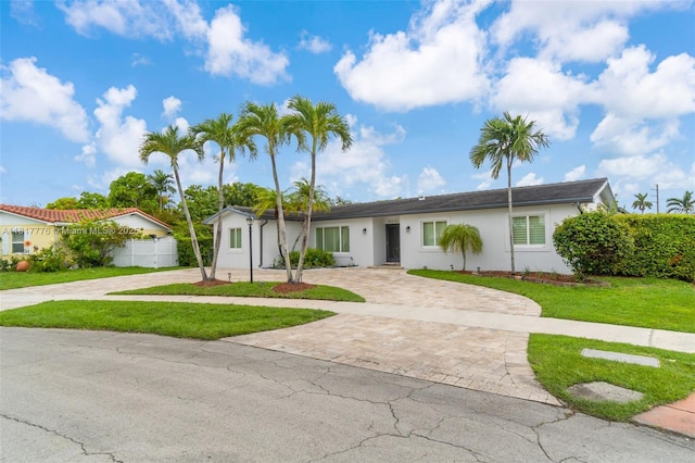 10223 SW 17th St, Miami, FL 33165 - single story home featuring curved driveway and stucco siding