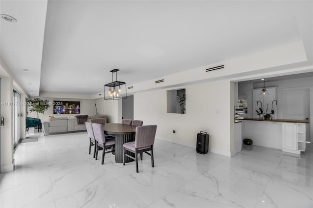 10223 SW 17th St, Miami, FL 33165 - dining room with light marble finish floors and baseboards