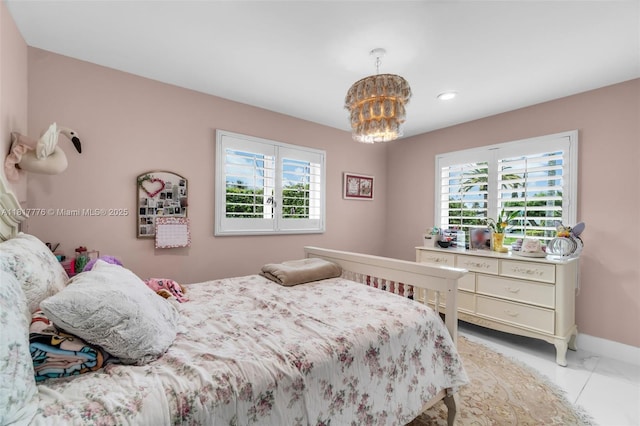 10223 SW 17th St, Miami, FL 33165 - bedroom with light marble finish flooring, recessed lighting, a chandelier, and baseboards
