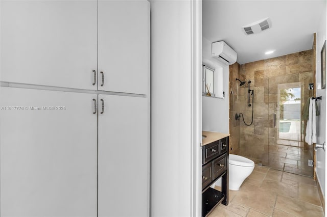 10223 SW 17th St, Miami, FL 33165 - bathroom with a shower stall, a wall mounted AC, toilet, stone tile floors, and vanity