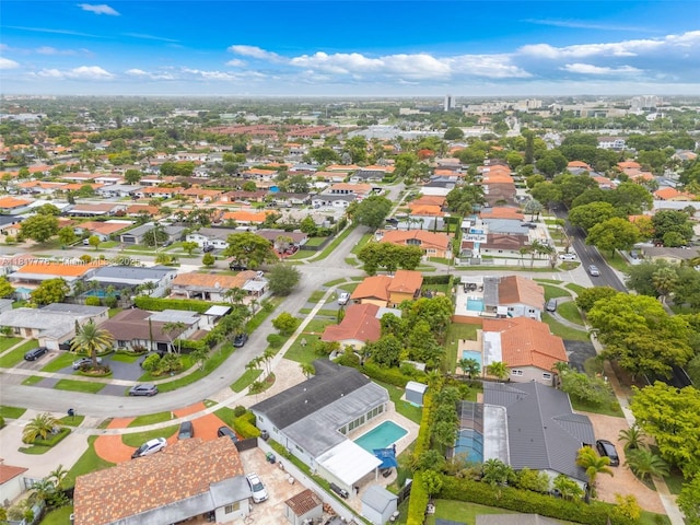 10223 SW 17th St, Miami, FL 33165 - aerial view of property and surrounding area featuring nearby suburban area and a pool area