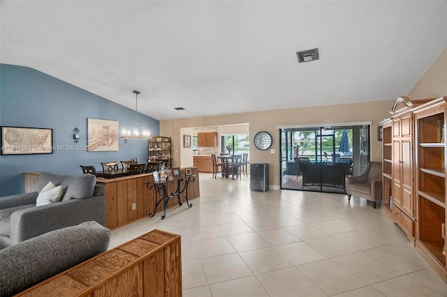 13317 NW 8th Ct, Sunrise, FL 33325 - living room featuring lofted ceiling, light tile patterned floors, and a chandelier