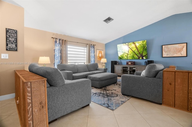 13317 NW 8th Ct, Sunrise, FL 33325 - living room featuring lofted ceiling, light tile patterned floors, and baseboards