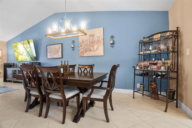 13317 NW 8th Ct, Sunrise, FL 33325 - dining area featuring vaulted ceiling, a chandelier, tile patterned flooring, and baseboards