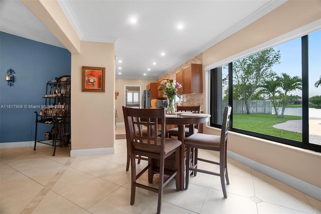 13317 NW 8th Ct, Sunrise, FL 33325 - dining room with ornamental molding, healthy amount of natural light, baseboards, a water view, and recessed lighting