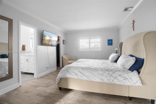 13317 NW 8th Ct, Sunrise, FL 33325 - bedroom featuring ornamental molding, wood finished floors, baseboards, and ensuite bath
