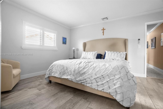 13317 NW 8th Ct, Sunrise, FL 33325 - bedroom featuring crown molding, wood finished floors, and baseboards