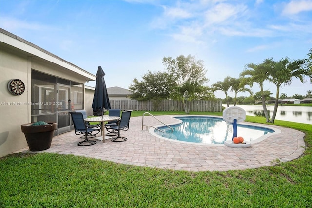 13317 NW 8th Ct, Sunrise, FL 33325 - view of pool featuring a patio, a sunroom, and a water view