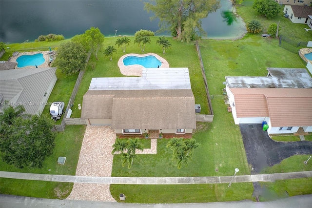 13317 NW 8th Ct, Sunrise, FL 33325 - view of subject property with a pool area and a nearby body of water