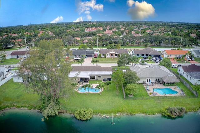 13317 NW 8th Ct, Sunrise, FL 33325 - aerial perspective of suburban area featuring a pool area and a nearby body of water