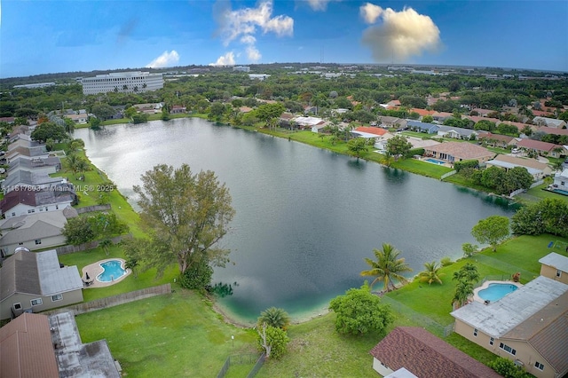 13317 NW 8th Ct, Sunrise, FL 33325 - drone / aerial view of a nearby body of water and a pool