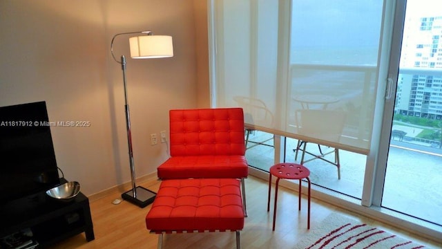 1830 S Ocean Dr Unit 1705, Hallandale Beach, FL 33009 - living area with light wood-style floors and baseboards