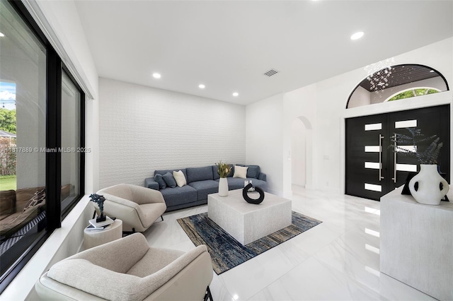 3461 SW 145th Ave, Miramar, FL 33027 - living area featuring arched walkways, recessed lighting, and marble tiled flooring