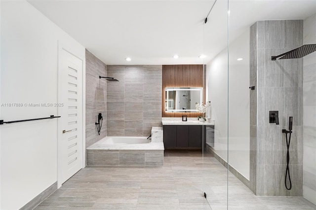 3461 SW 145th Ave, Miramar, FL 33027 - full bath with tiled shower, vanity, tiled tub, and recessed lighting