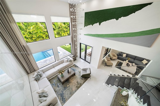 3461 SW 145th Ave, Miramar, FL 33027 - living area with marble tiled floors and a towering ceiling