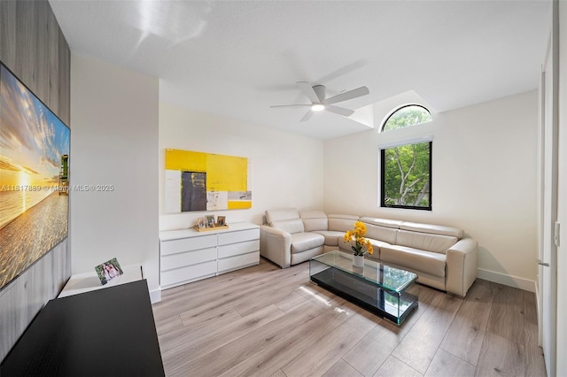 3461 SW 145th Ave, Miramar, FL 33027 - living room with light wood-style flooring, a ceiling fan, lofted ceiling, and baseboards