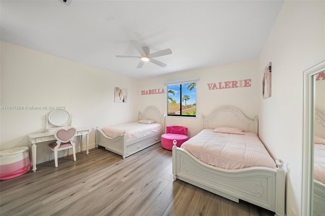 3461 SW 145th Ave, Miramar, FL 33027 - bedroom featuring wood finished floors and a ceiling fan