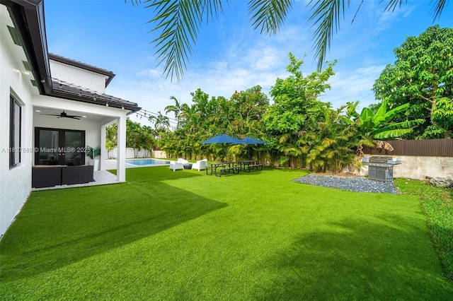 3461 SW 145th Ave, Miramar, FL 33027 - view of yard with ceiling fan and a patio