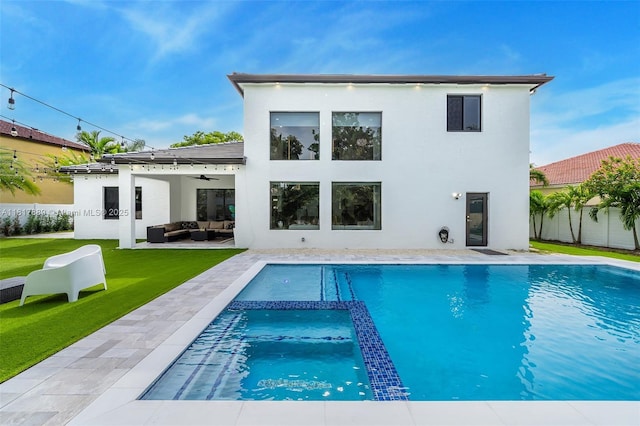 3461 SW 145th Ave, Miramar, FL 33027 - rear view of house featuring an outdoor living space, stucco siding, a lawn, and ceiling fan