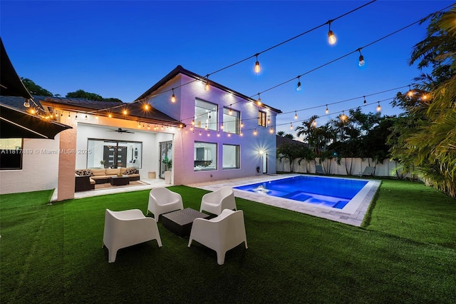 3461 SW 145th Ave, Miramar, FL 33027 - back of house featuring an outdoor living space, stucco siding, and a patio