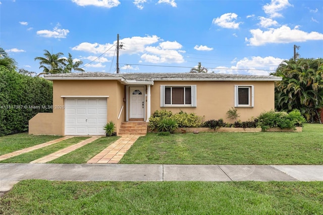 3241 SW 20th St, Miami, FL 33145 - single story home featuring stucco siding, an attached garage, a front lawn, and driveway